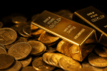 Gold bars resting on stacked coins, symbolizing the Fed impact on gold as investors react to weaker jobs data and shifting Federal Reserve expectations.