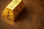 Gold and silver bars with inflation charts and market data as investors monitor CPI, PPI, tariffs, and Federal Reserve policy.